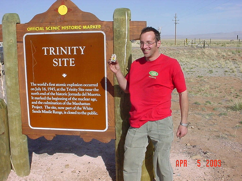 meatentrance Me at the turnoff to the Trinity site. It is, or at least was open to the public 2 days a year. It was still radioactive, though much less than on an airplane. (I have measured both) It is east of Socorro NM in the White Sands Missle Range.